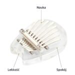 Mała akrylowa kalimba w kształcie kropli na żółtym tle