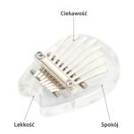 Mała akrylowa kalimba w kształcie kropli na żółtym tle