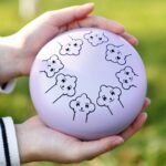 Bęben języczkowy 5,5 cala w dłoniach — motyw chmurek