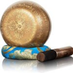 Instrument Muzyczny z Medytującymi Buddami i Odlewami - instrument muzyczny