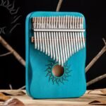 Kalimba 21 tonów w kolorze niebieskim z motywem słońca